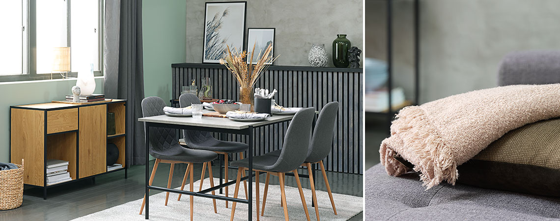 Camera de zi cu masă de dining cu aspect de beton, scaune gri de sufragerie și bufet din stejar