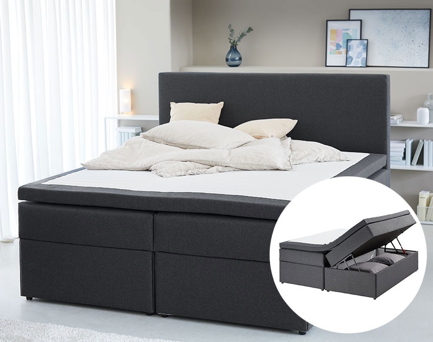 Continental bed with a compartment at the bed base for extra duvets and pillows