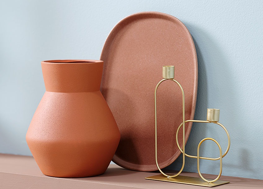 Terracotta vase, tray, and candlestick