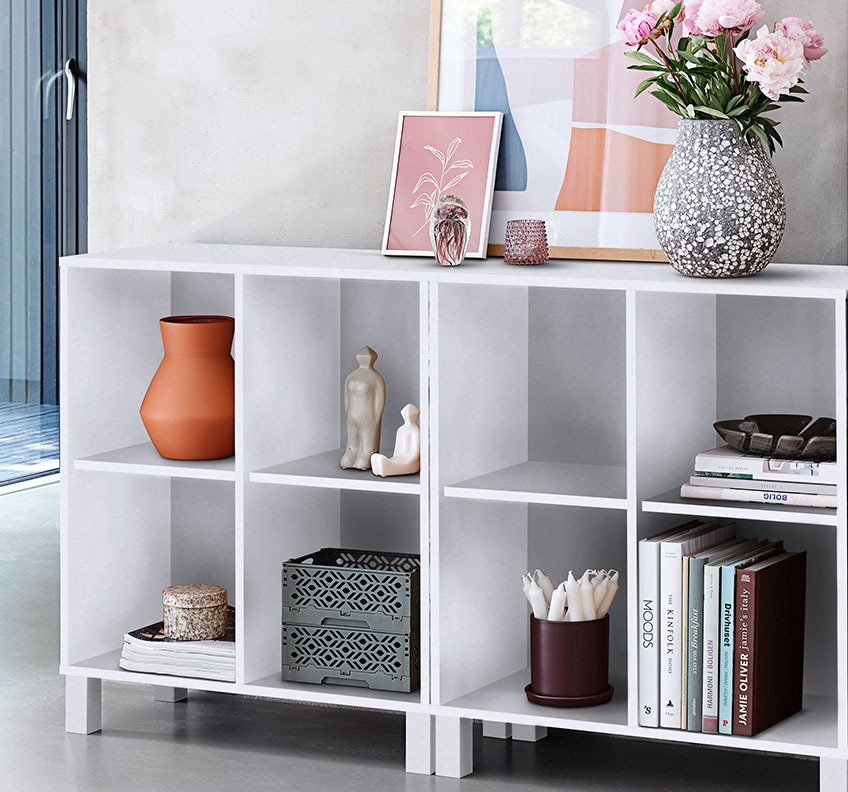 Bookcase with books and various décor 