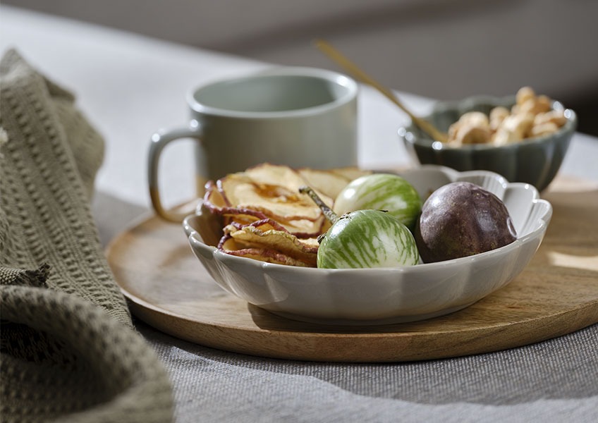 SIMON bowl and GERNER wood tray Wooden tray with grey bowl filled with fruits placed on sofa